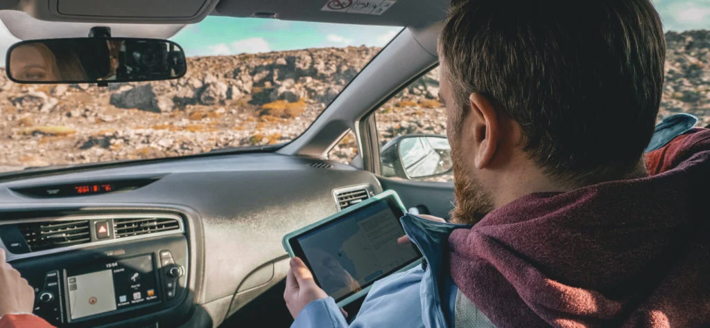 Screenshots of the Driver Guide app showing maps, points of interest and route planning on multiple devices